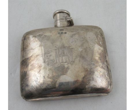 A George V silver hip flask, of plain form with engraved initials, 4o, &pound;100