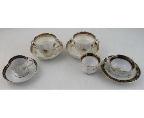 A pair of Caughley chocolate cups and saucers, together with a trio and a cup and saucerCondition Report:  The single cup is 