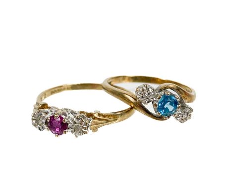 Two 9ct gold diamond and gem set three stone rings. One set with a blue topaz flanked by small illusion set diamonds, size N,