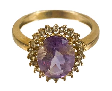 A contemporary 9ct pale amethyst and white stone set cluster ring. Size N 1/2, 3.08g.