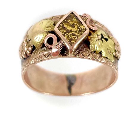 A rare 19th century rose gold Gilpin County Colorado bi-colour miners ring. Rose and green gold applied fruiting vine to the 