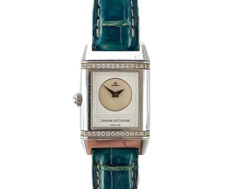 A Jaeger LeCoultre Reverso Duetto diamond set stainless steel manual wind ladies wristwatch. Ref. 266.8.44, silver guilloche 