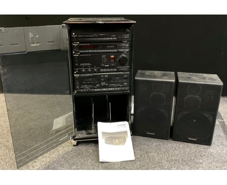 A Technics stackable stereo music system - automatic turntable system SL-J300R, stereo tuner ST-X880L, stereo integrated ampl