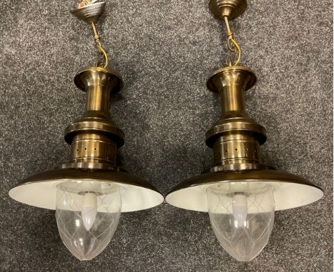 A pair of contemporary Industrial style pendant light fittings, brushed brass finish, white enamel interiors, each measuring 