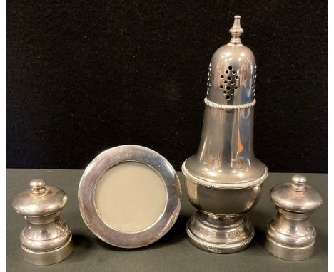 Two silver salt and pepper grinders, London 1992;  circular easel picture frame, Sheffield 1986;  Arthurs Price silver plated