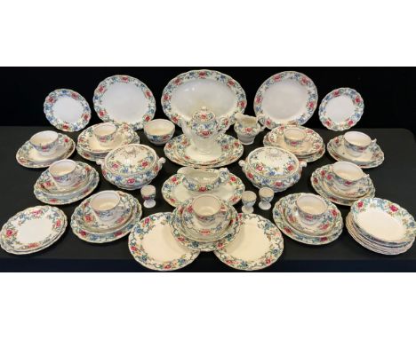 Booths and Doulton Floradora pattern table service for eight, comprising plates, soup bowls, pair of tureens, etc 