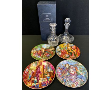 A Stuart Crystal ships decanter;  another Port;  four Royal Doulton Spellbinder collectors plates 