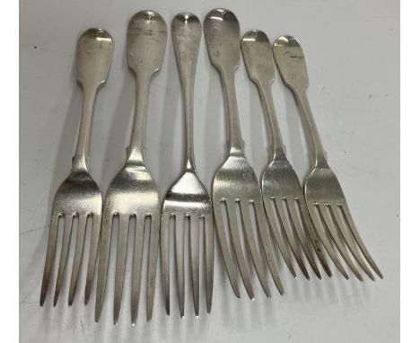A set of three Victorian silver fiddle pattern dessert forks (by James Beebe, London 1839) together with a pair of matching t
