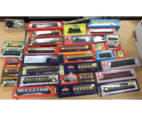A collection of 00 railway locomotives, coaches and rolling stock etc to include a Hornby RO51 GWR 060 PT locomotive, a Hornb