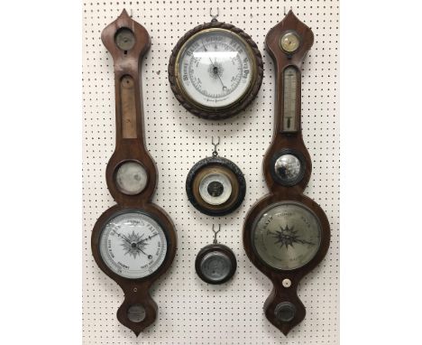 A 19th Century mahogany cased banjo barometer with alcohol thermometer, signed "Tasker Banbury", 94 cm high, together with an