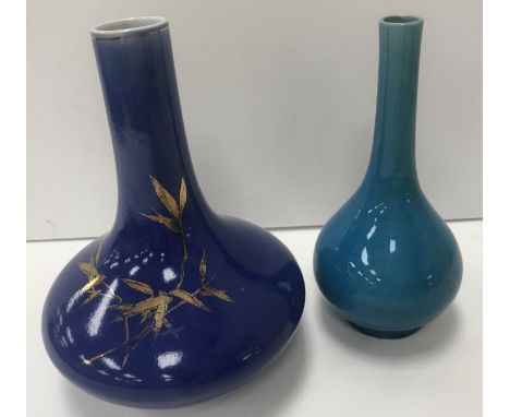 A Chinese turquoise glazed onion-shaped vase with narrow neck raised on a circular foot, 15 cm high, together with a modern b