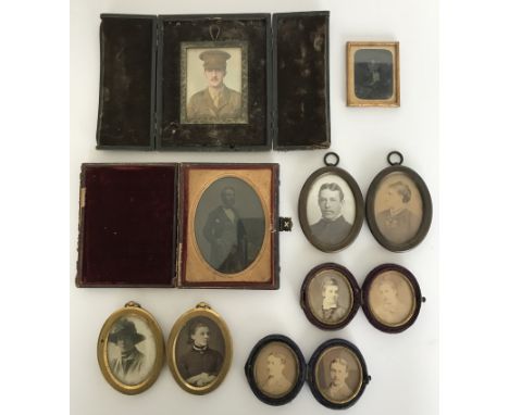 A collection of various portrait miniatures including a heightened photographic portrait of "A young man in First World War m