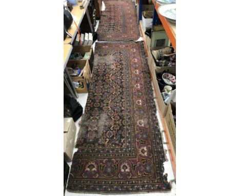 Two vintage Agra carpet sections with scrolling floral borders approx. 248 cm x 80 cm and 250 cm x 88 cm (2)