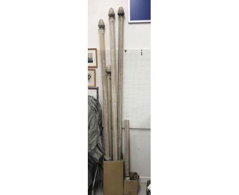 A collection of five curtain poles the tallest approx. 273 cm and two missing one finial together with wooden curtain poles a