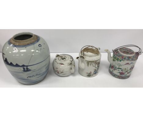 A 19th Century Chinese blue and white ginger jar (missing lid), 22.5 cm high, together with a Chinese famille rose decorated 