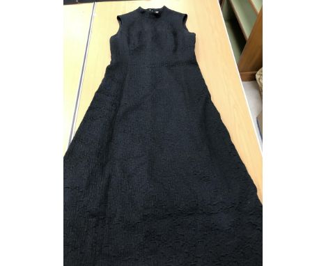 A quantity of ladies clothing to include a Susan Small evening dress and coat in black silk type figured fabric, bust on dres