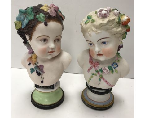 A pair of Jeune Gille polychrome decorated biscuit ware figural busts "Printemps" and "Automne", bear blue tablet monogram ma