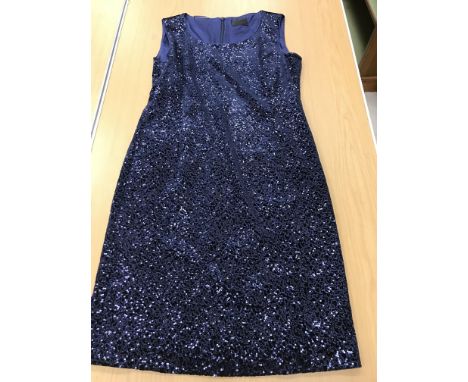 A sleeveless cocktail dress by Caroline Charles Studio in midnight blue sequined fabric, lined with blue satin, labelled as U