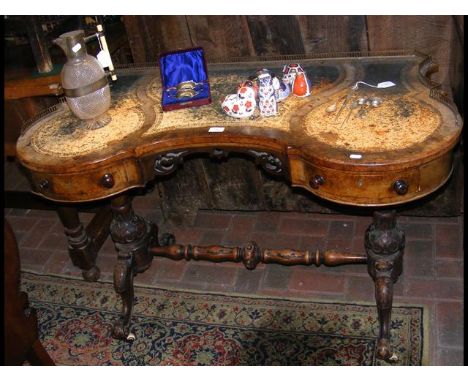 A Victorian walnut lady's writing desk with brass gallery 