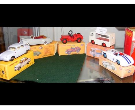 Five reconditioned Dinky Toys in reproduction boxes, including "Electric Dairy Van"  