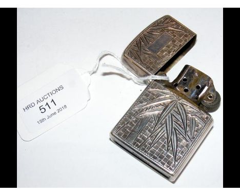 A Japanese sterling silver cased lighter 