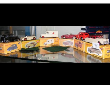 Six reconditioned Dinky Toys in reproduction boxes, including Austin-Healey '100' Sports 