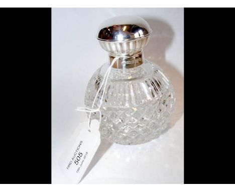 Silver lidded cut glass globular scent bottle 