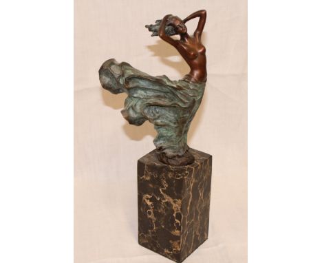 A modern French bronze figure of a classical semi-nude female on black marble plinth, 12½" high 