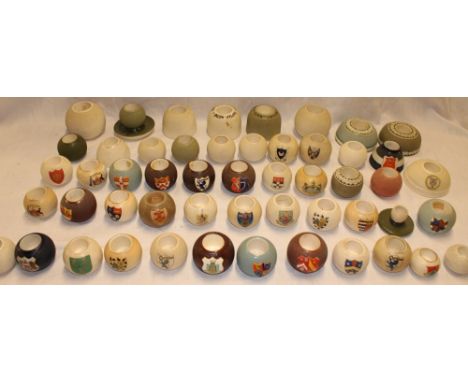 A collection of over 50 various traditional spherical match strikers and match holders including advertising match strikers b