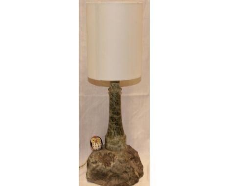 A Cornish serpentine lighthouse table lamp on rocky base, 12" high together with a modern shade 