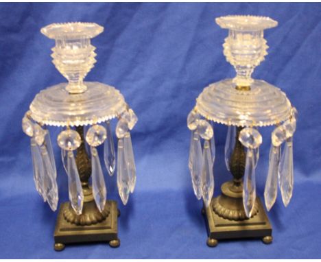 A pair of bronzed metal and cut-glass table lustres with lozenge droplet decoration,11" high
