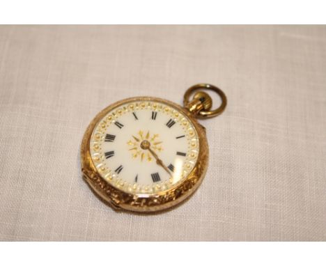 A lady's 14ct gold fob watch with decorated circular dial in engraved case (22.7g)