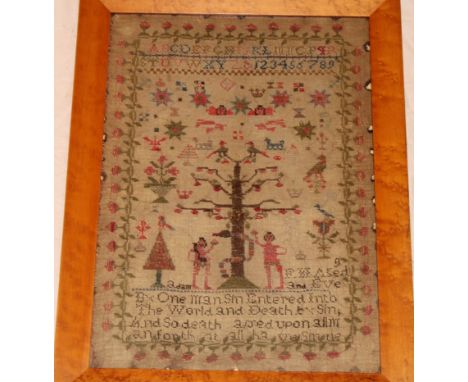 An early 19th Century needlework sampler depicting Adam and Eve, alphabet, numbers and text, 16½" x 12"