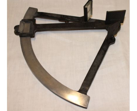A painted aluminium sextant with curved calibrated dial 
