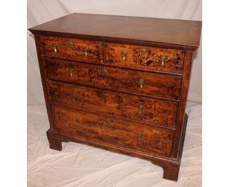 A late 17th/early 18th Century walnut and burr-walnut cross banded chest of two short and three long drawers with brass drop 