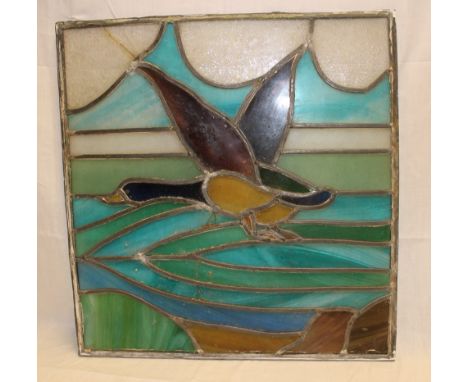 An old leaded glazed rectangular window panel with duck decoration, 23½" x 22½"