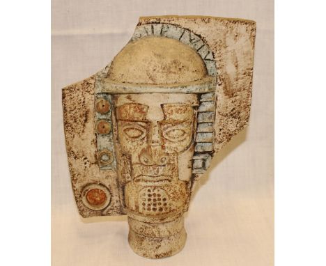 A Troika pottery masked figure marked "Troika TD", 10" high (damaged) 