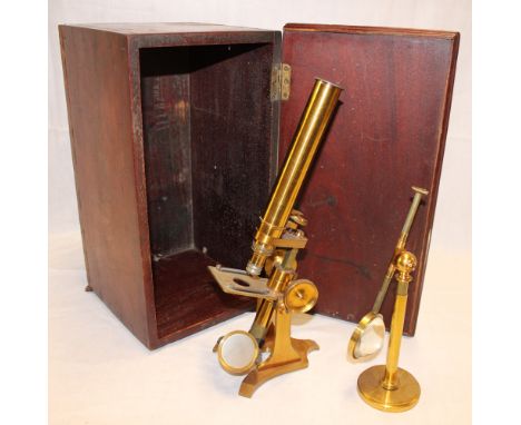 A brass monocular microscope by Cary of 181 The Strand, London in accompanying mahogany case together with a brass adjustable