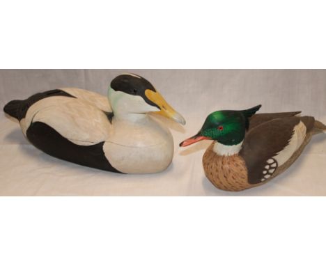 Two Cornish carved wood duck decoys by Arthur Morton-Watson of Fowey, Cornwall including Common Eider Duck and Red Breasted M