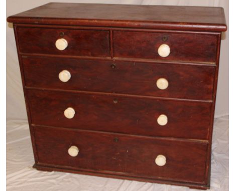 A Victorian stained pine chest of two short and three long drawers with ceramic handles, 38" high x 43" wide