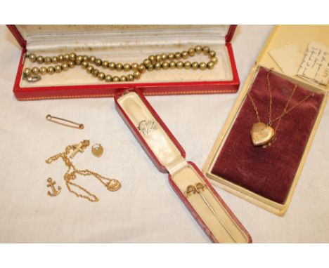 A 9ct gold mounted heart-shaped locket pendant, 9ct gold bar brooch and a selection of various decorative jewellery including