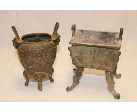 An Eastern bronze rectangular koro with geometric decoration and four scroll legs, 5½" high and one other Eastern bronze koro