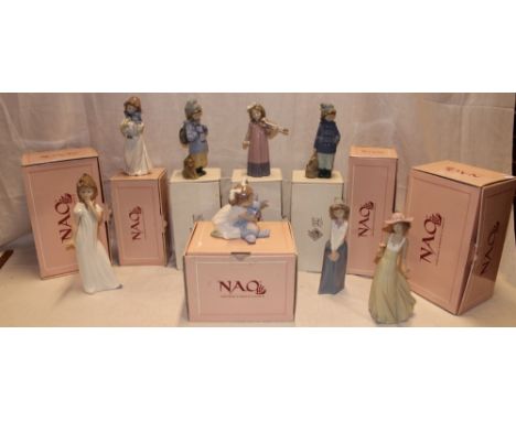 Eight various Nao china female figures in original boxes 