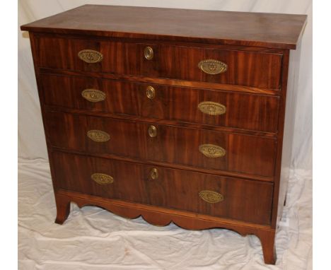 A 19th Century mahogany chest of four long graduated drawers with brass ring handles on bracket feet, 36" high x 41" wide