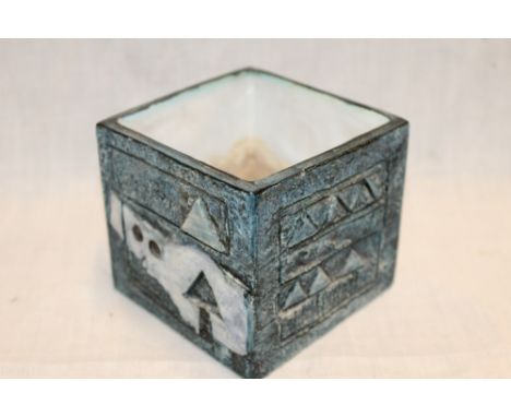A Troika pottery square bowl with geometric decoration on blue ground marked "Troika Cornwall LH", 3¼" high 