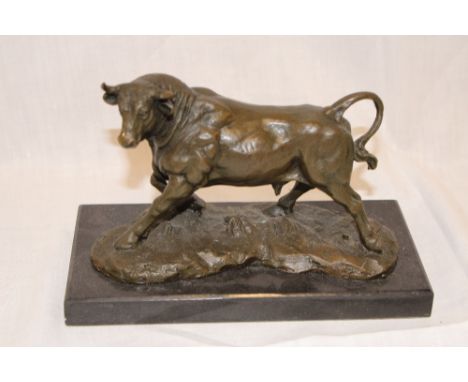 A modern French bronze figure of a bull on rectangular black marble base, 8½" long overall