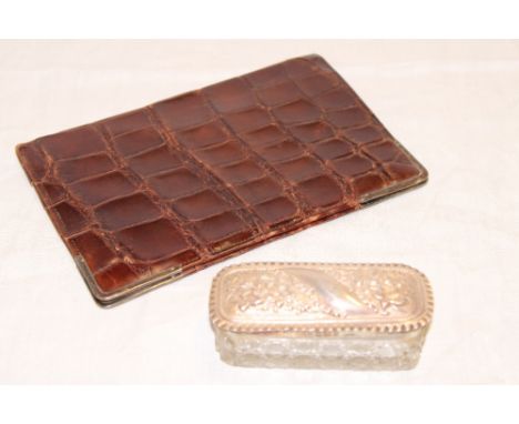 A silver mounted crocodile leather rectangular wallet and a silver mounted cut-glass dressing jar (2)