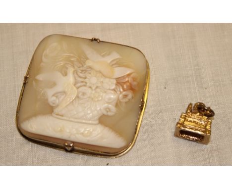 A good quality gilt mounted square cameo brooch with square panel depicting birds and flowers 