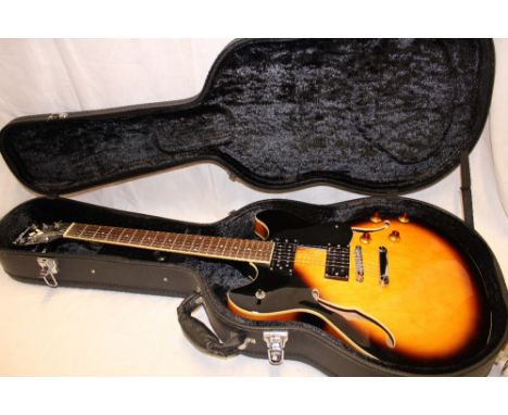 A Washburn model HB-30/TS electric acoustic guitar in fitted case