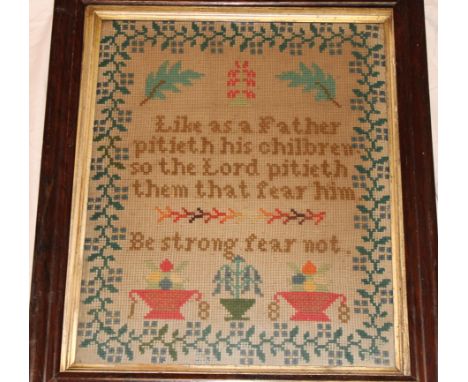 A Victorian needlework rectangular sampler with text and flowers dated 1888, 17" x 14"